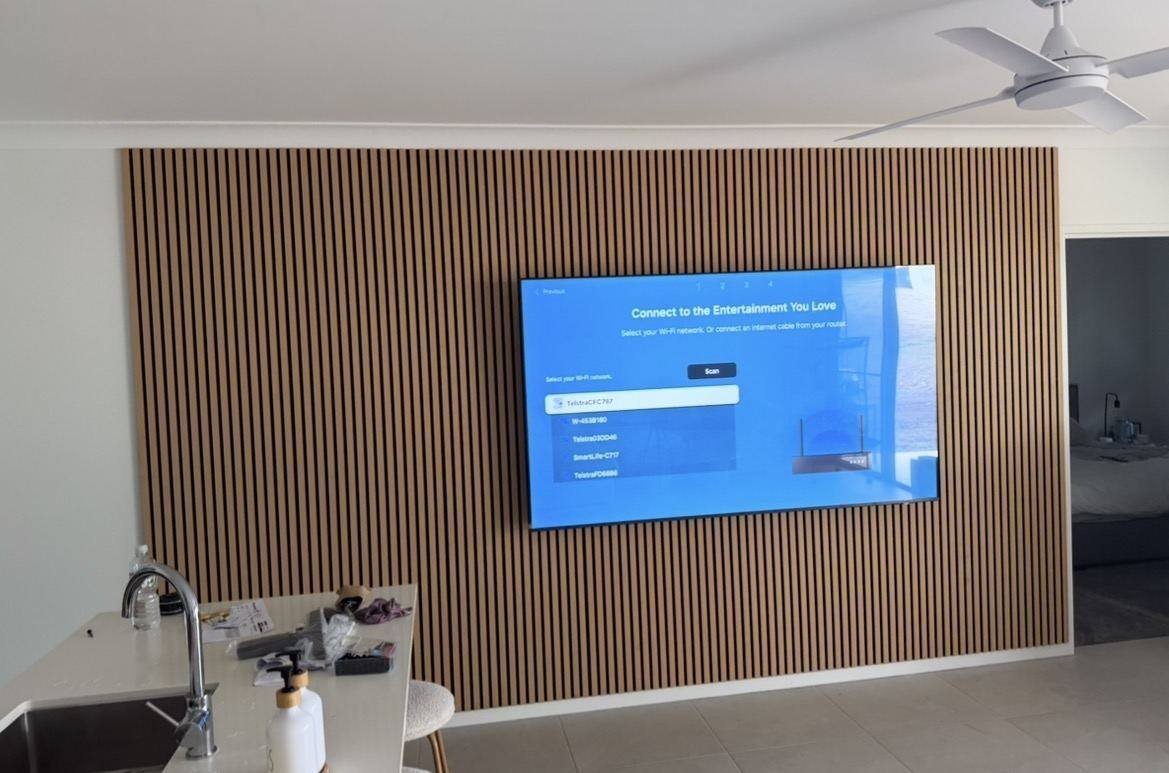 TV mount and timber slat feature wall