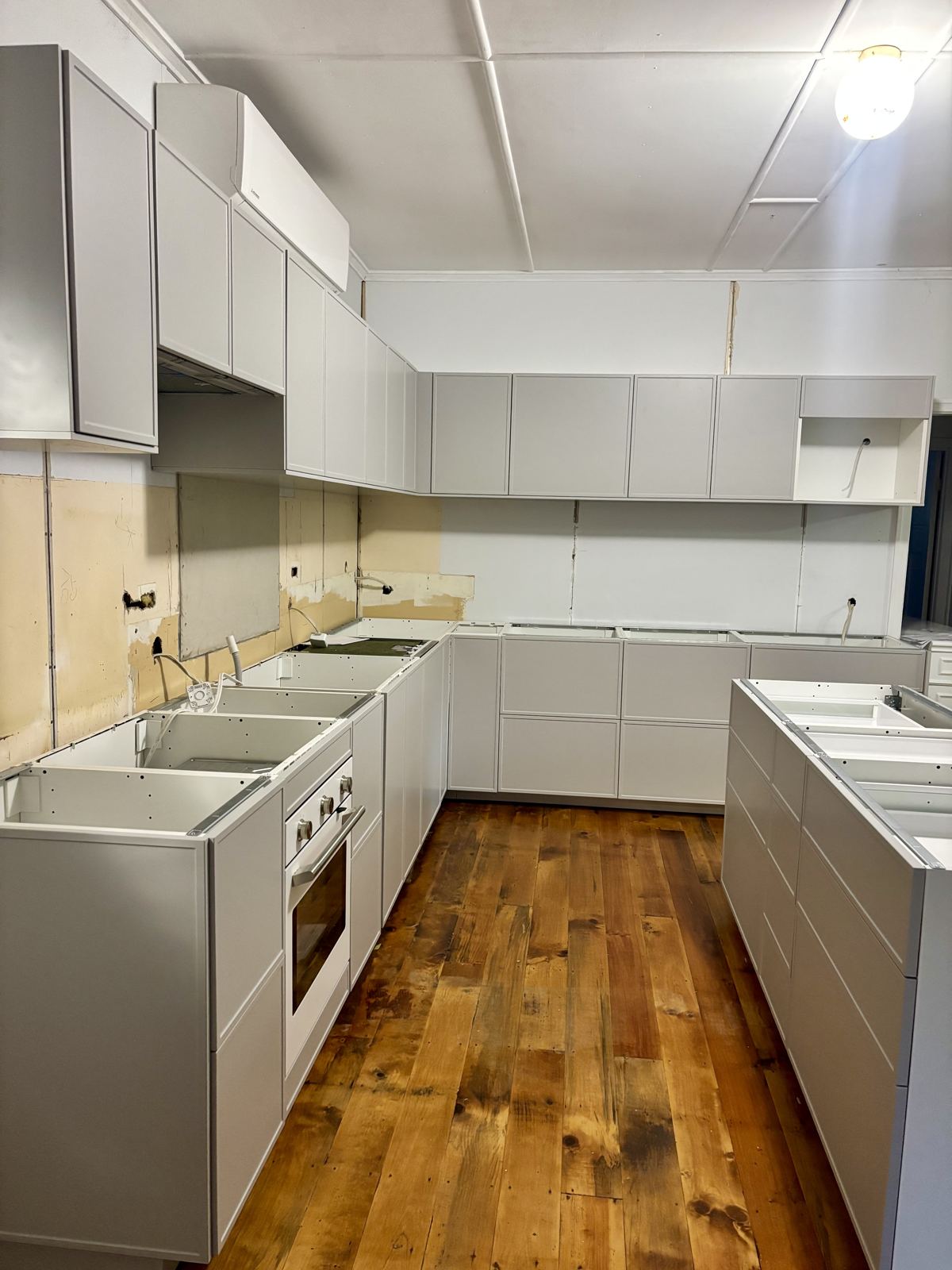 IKEA kitchen cabinetry installed, ready for stone benchtops